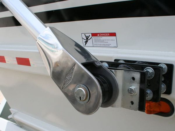 a close up photo of the arm-matic belly dump tarp system